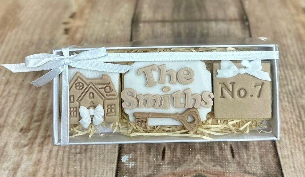 New home iced shortbread biscuits boxed with a ribbon